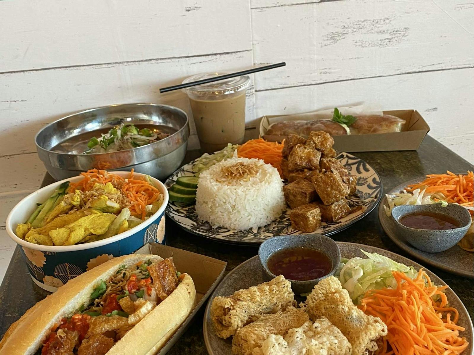 A table full of Vietnamese dishes A table full of Vietnamese dishes