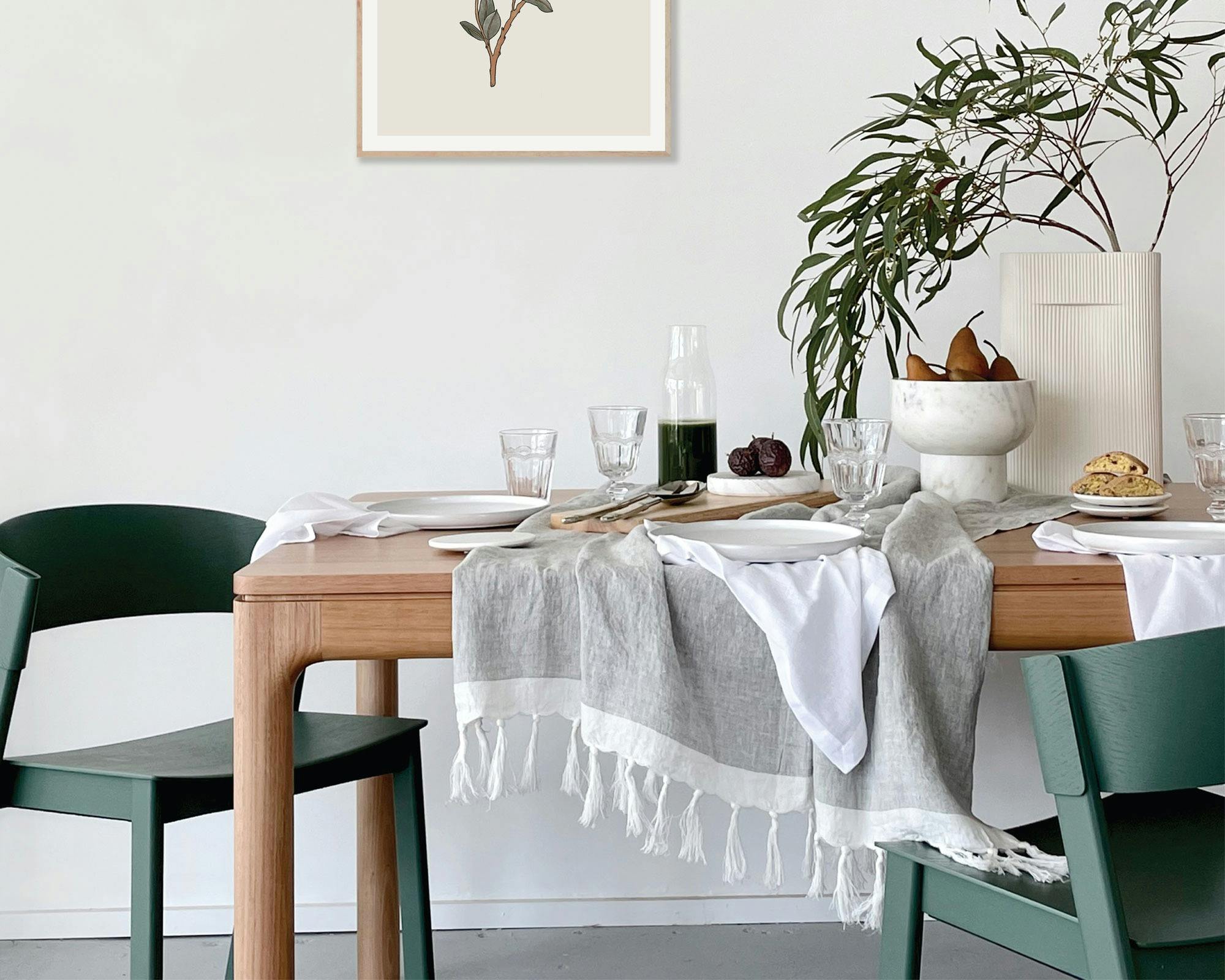 Dining table with vase.