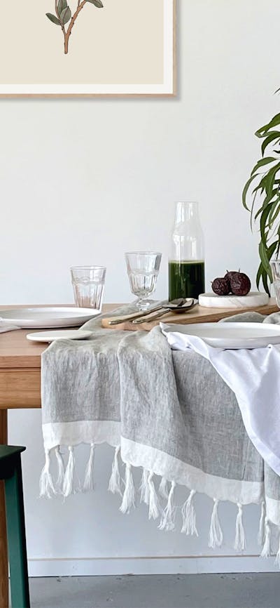 Dining table with vase.