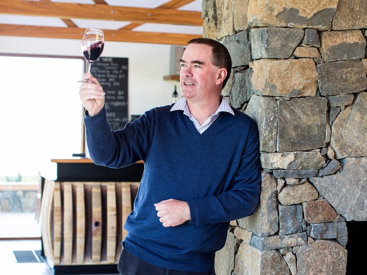 Winemaker Tim Kirk with a glass of red wine