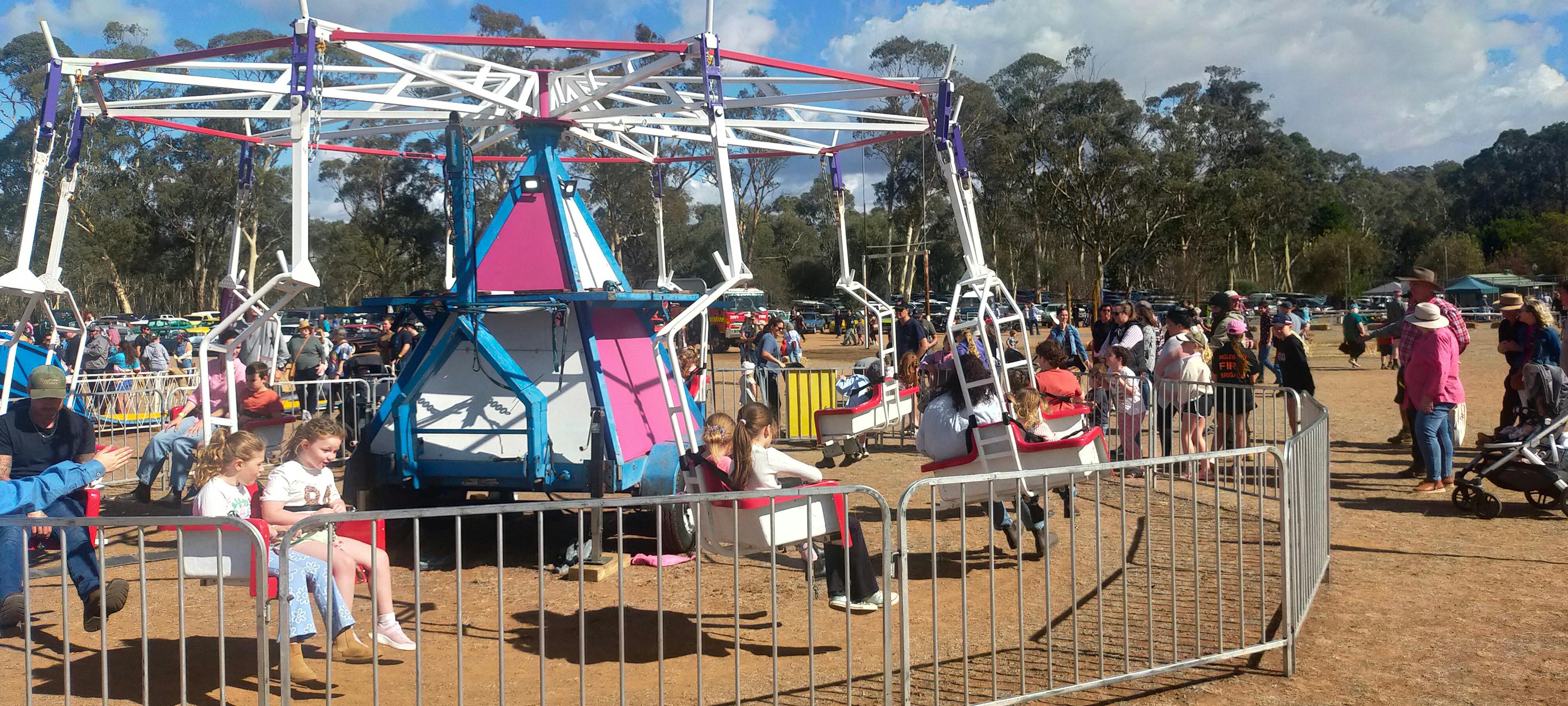 children's amusement rides. A swing that goes around and up in the air