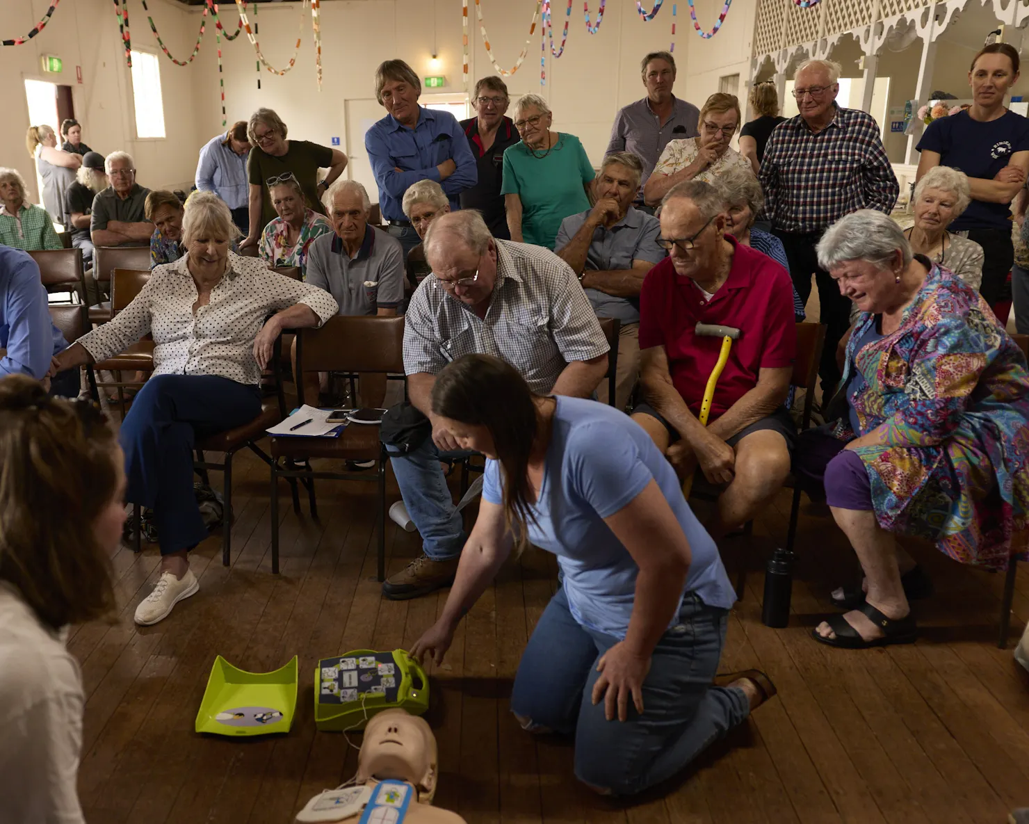 Community group attending workshop and learning CPR and AEDs