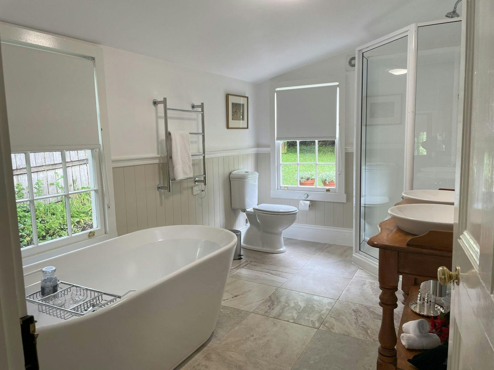 Luxury bathroom including huon pine double vanity, shower and free standing bath
