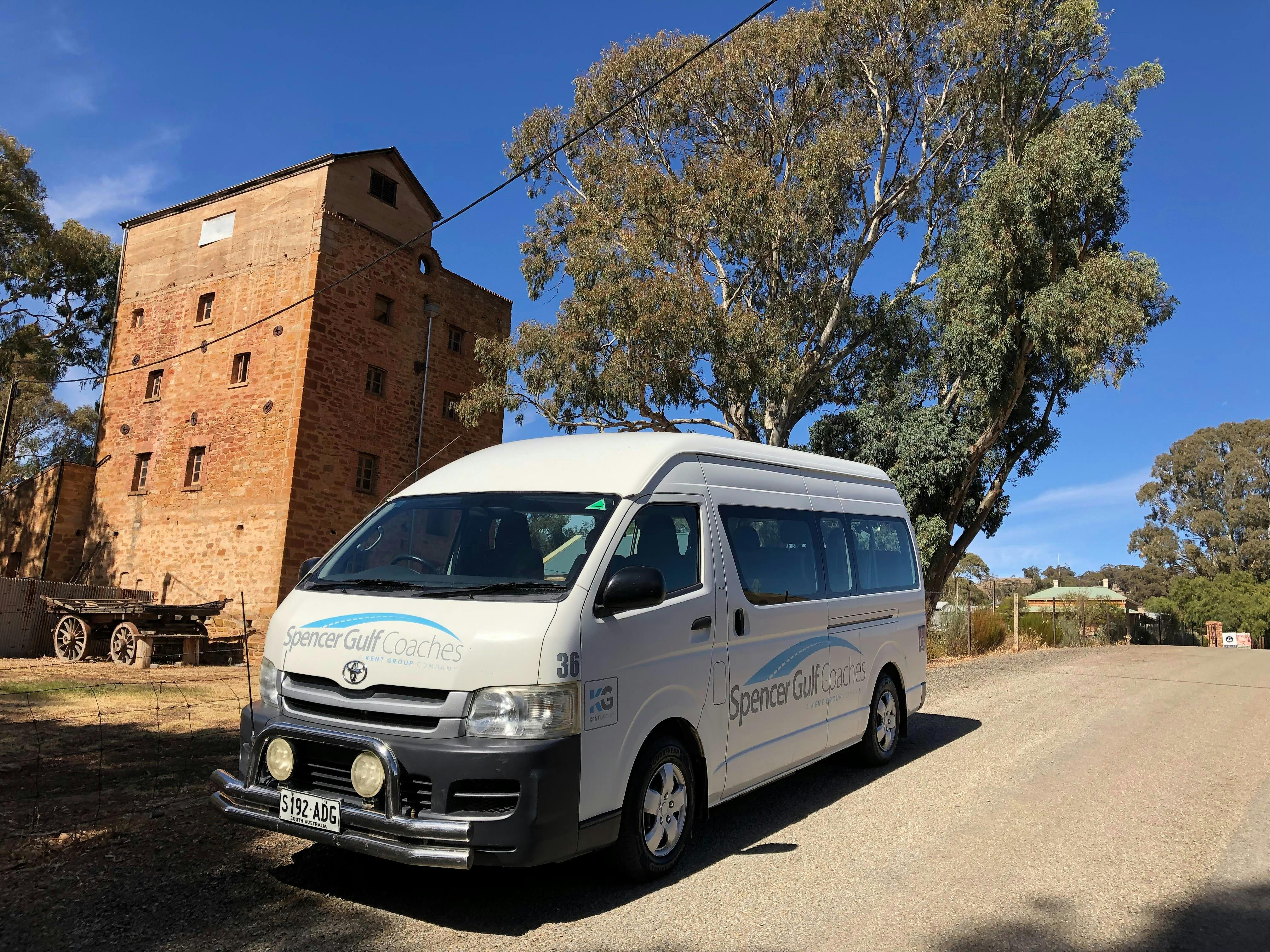 Micro Bus in front of Mill Building