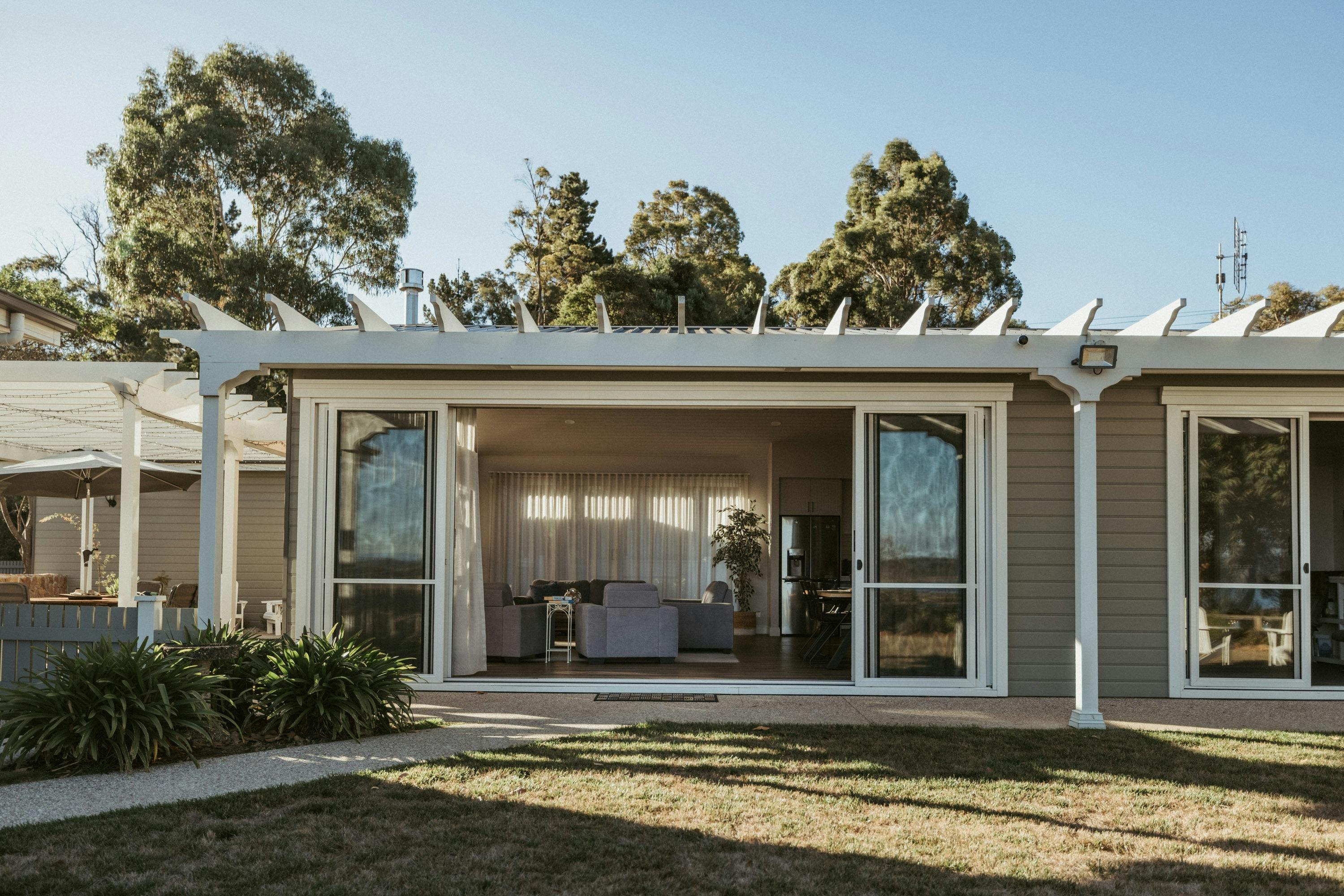 Light-filled open-plan living with sliding doors for seamless indoor-outdoor flow.