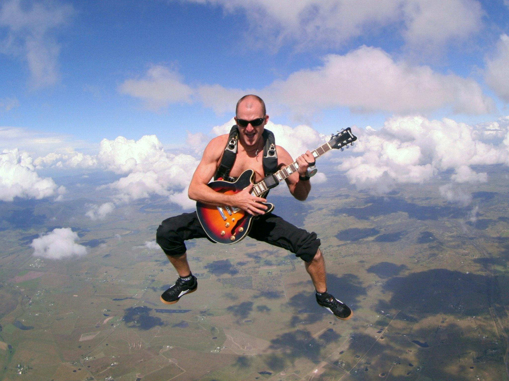 Rockstar - Sitflying guitar player - Equinox Boogie - Freefall and Music Festival