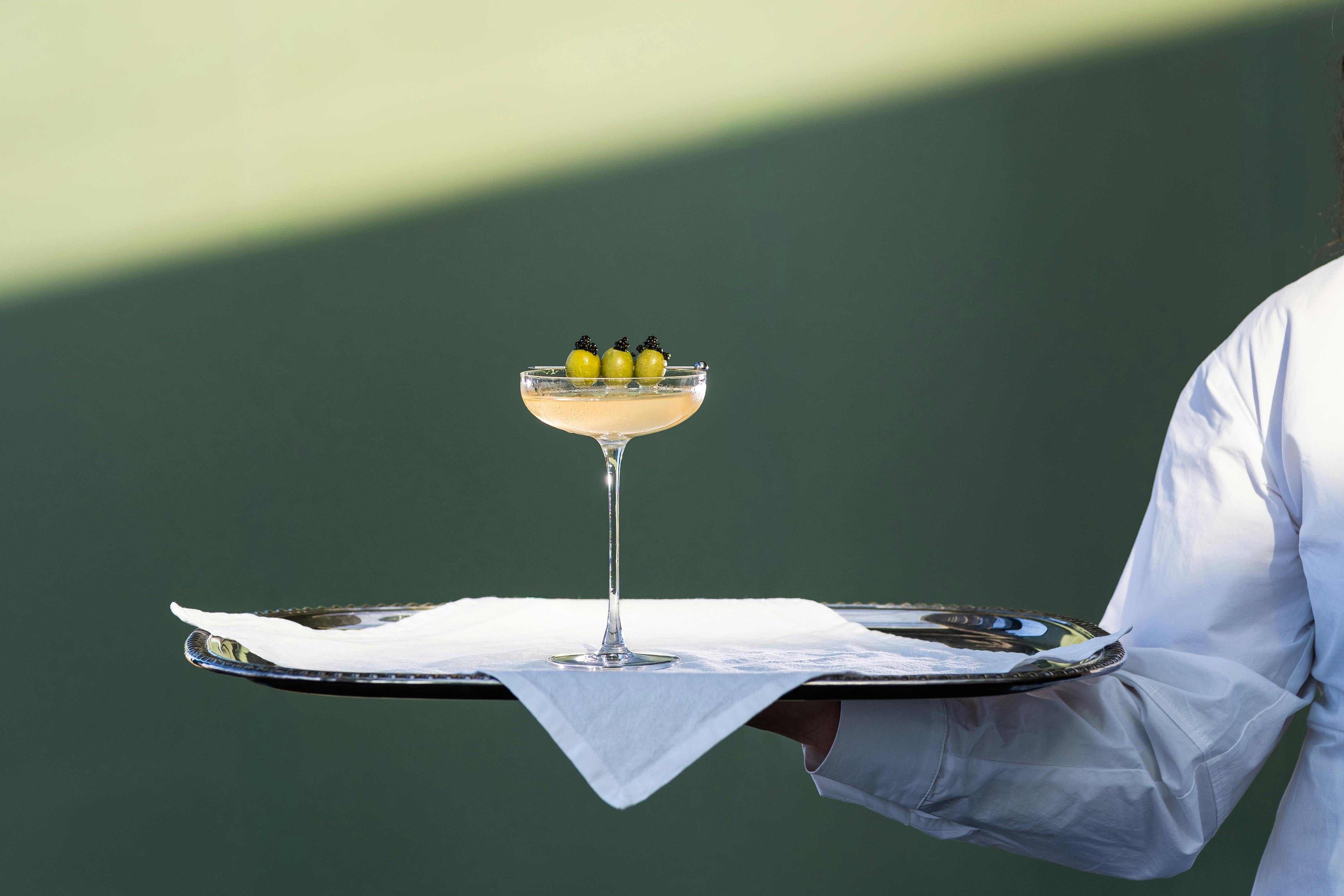 Martini glass with 3 olives