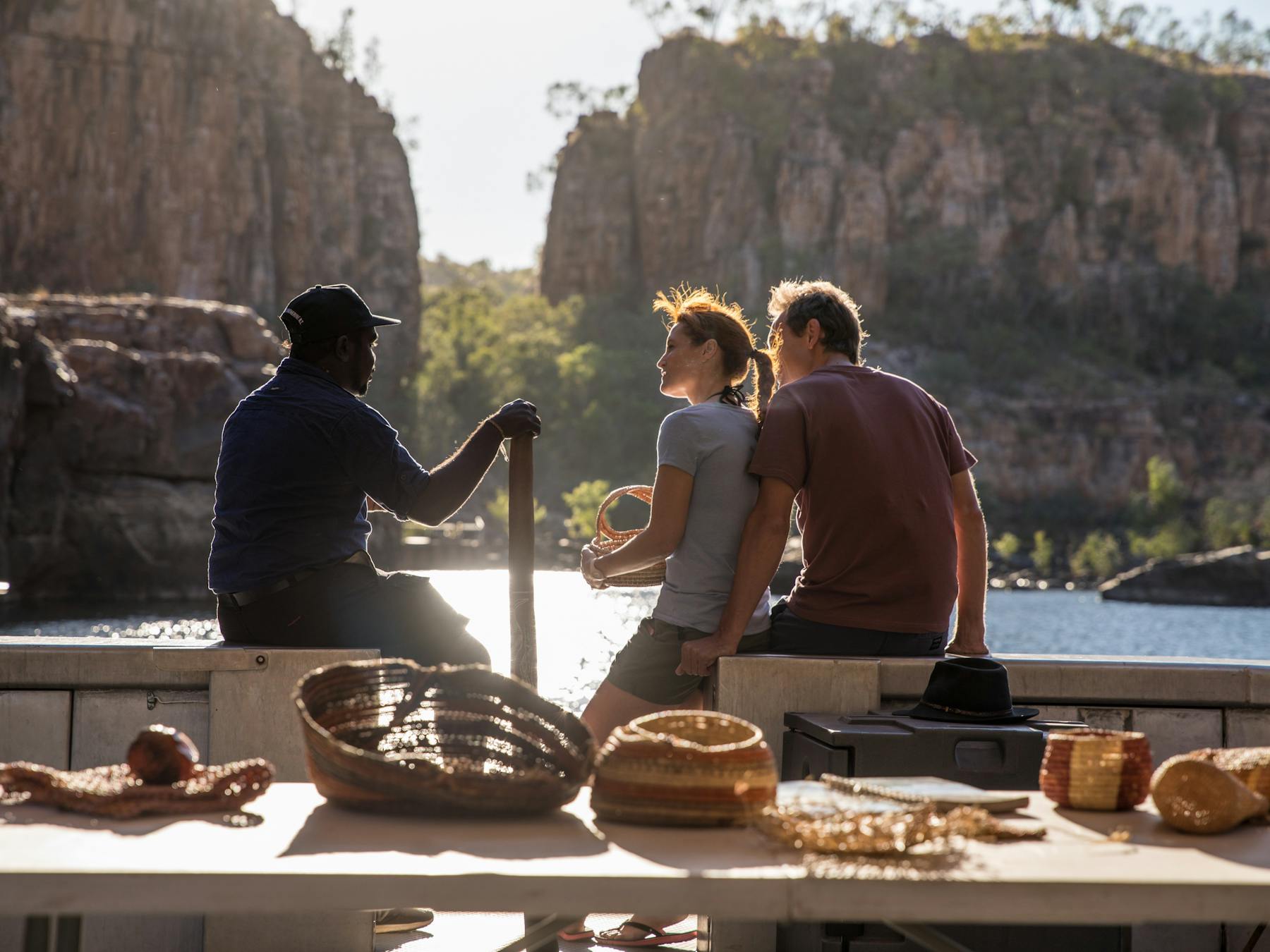 Visitors with an Aboriginal guide on a Nitmiluk Gorge Tour.