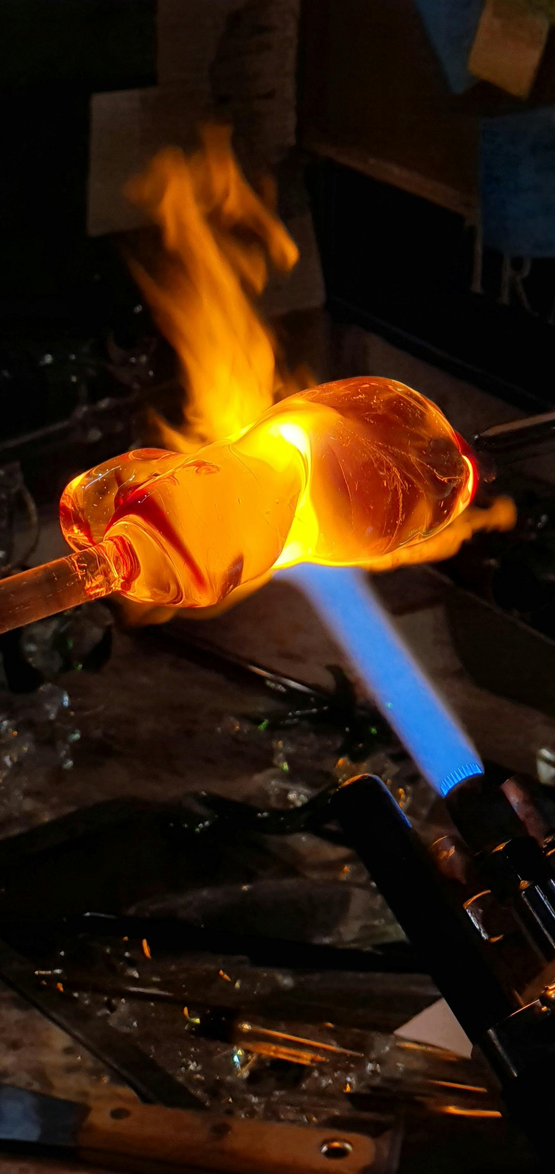 Watch as one of our glass artists  works the glass into a piece of art using a 2220'C flame