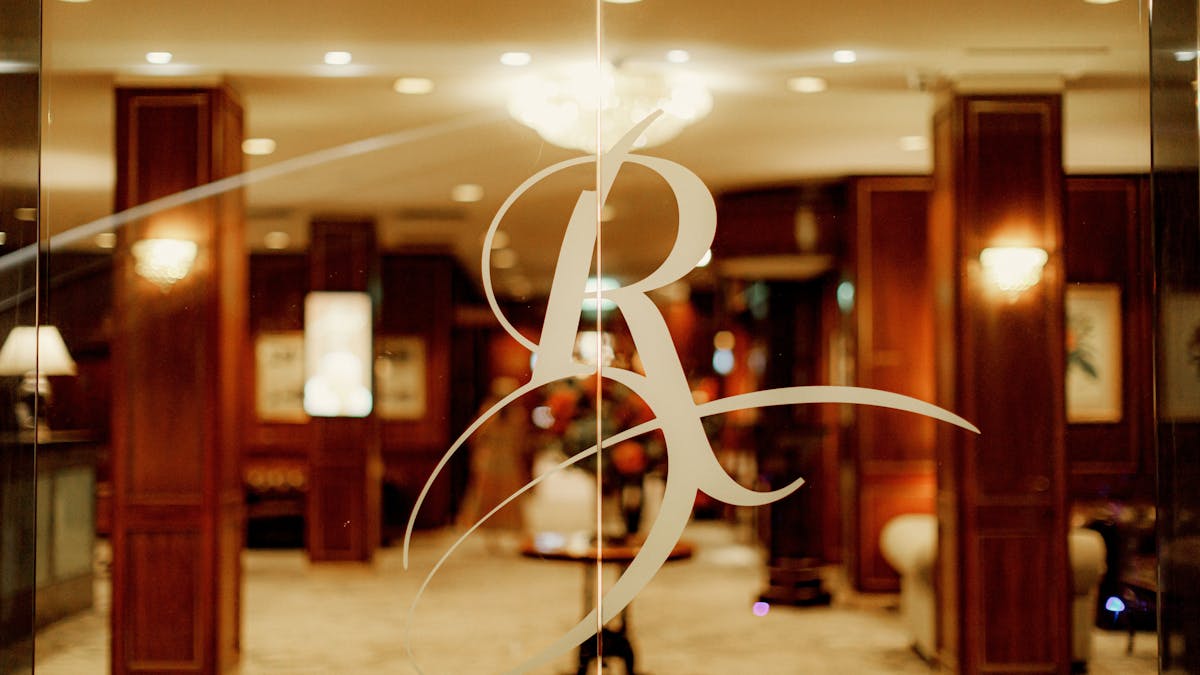 Royal R on glass door entry to Royal on the Park Hotel Brisbane