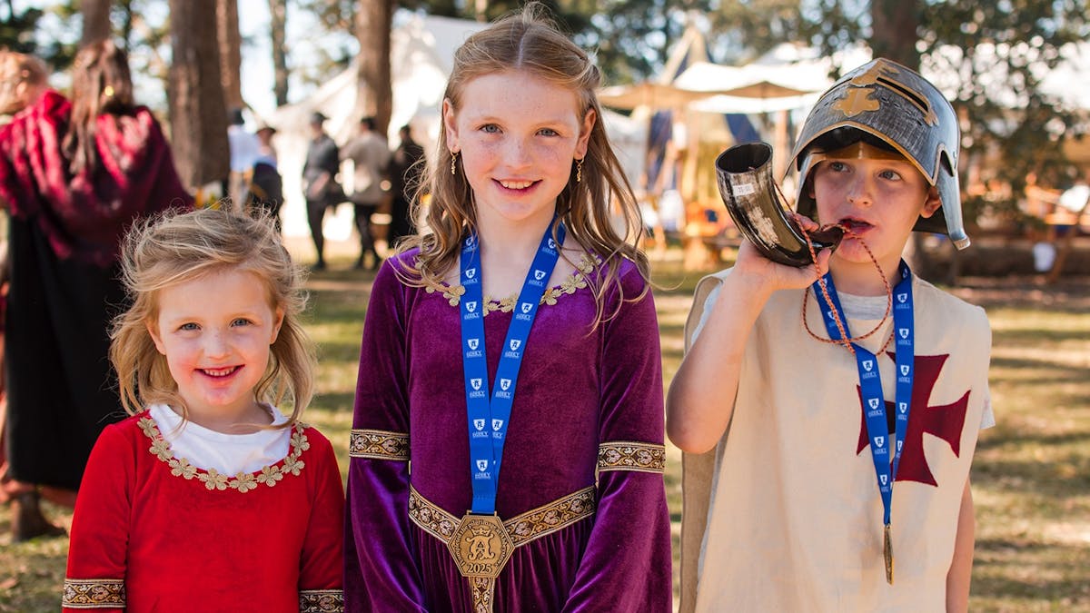 Children dressed in medieval costumes