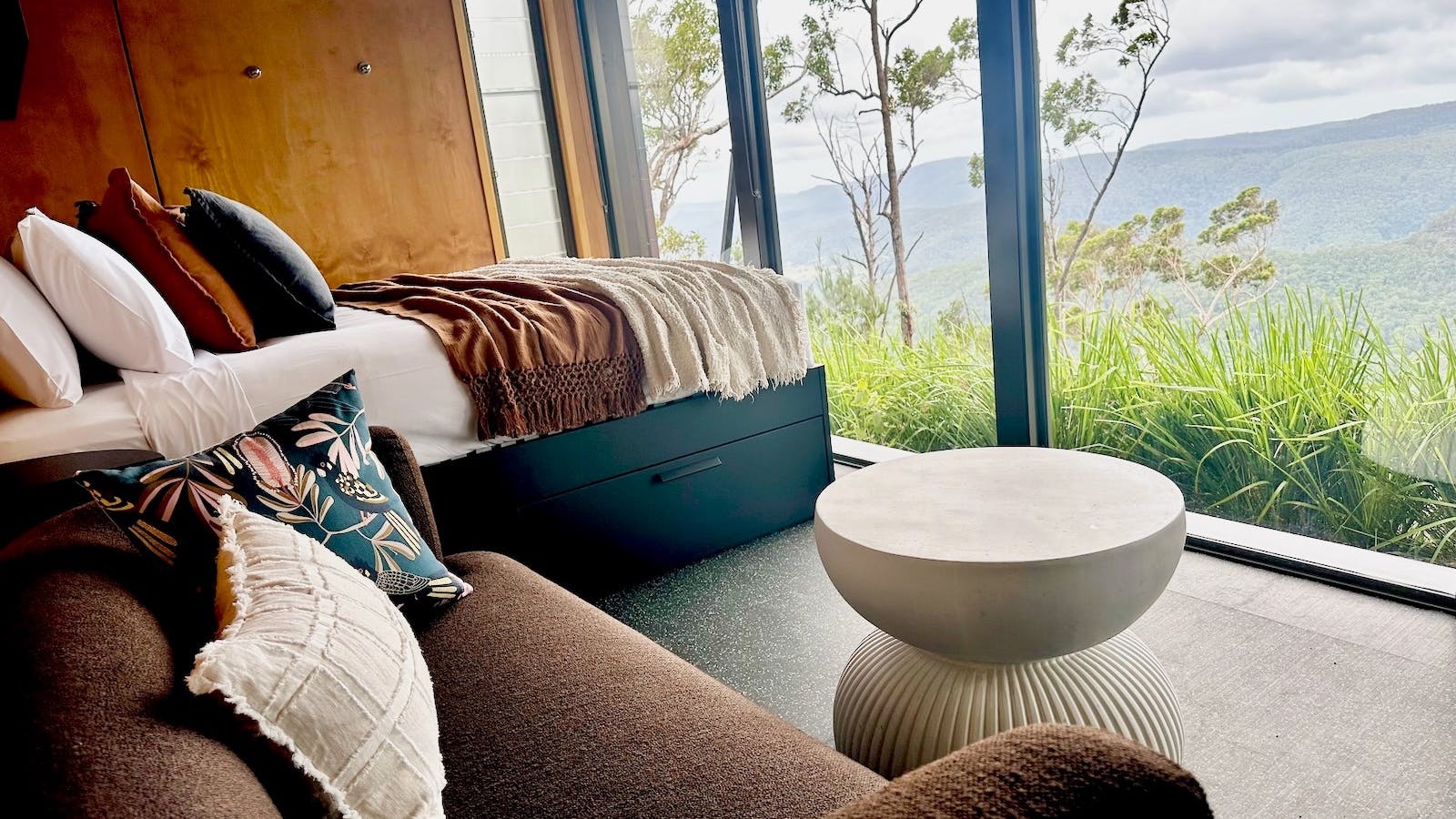 Tiny Wild House bedroom and lounge with views of the Ship Sterns Range from Binna Burra Tiny Wild House bedroom and lounge with views of the Ship Sterns Range from Binna Burra