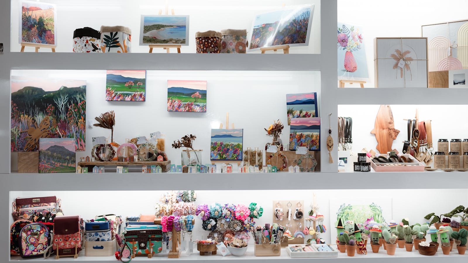 Shelves stocked with Tasmanian Made giftware and art at Tassie Makers Market