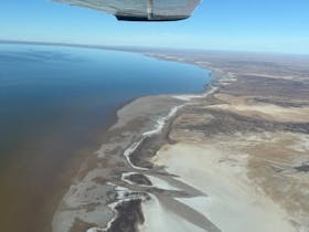 a view of Kati Thanda - Lake Eyre from the plane window.