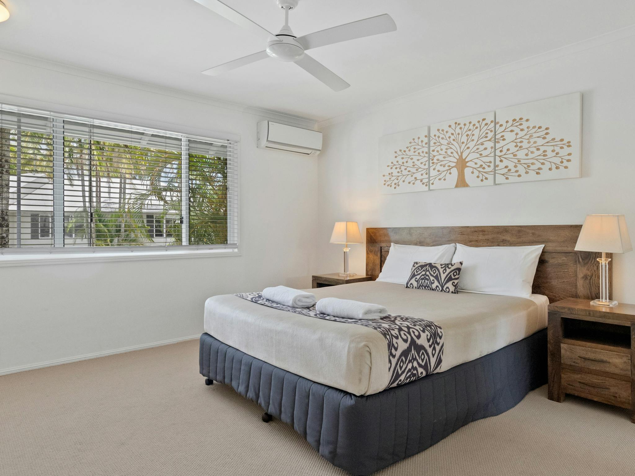 Bedroom with queen bed and bedside tablese tables Bedroom with queen bed and bedside tablese tables