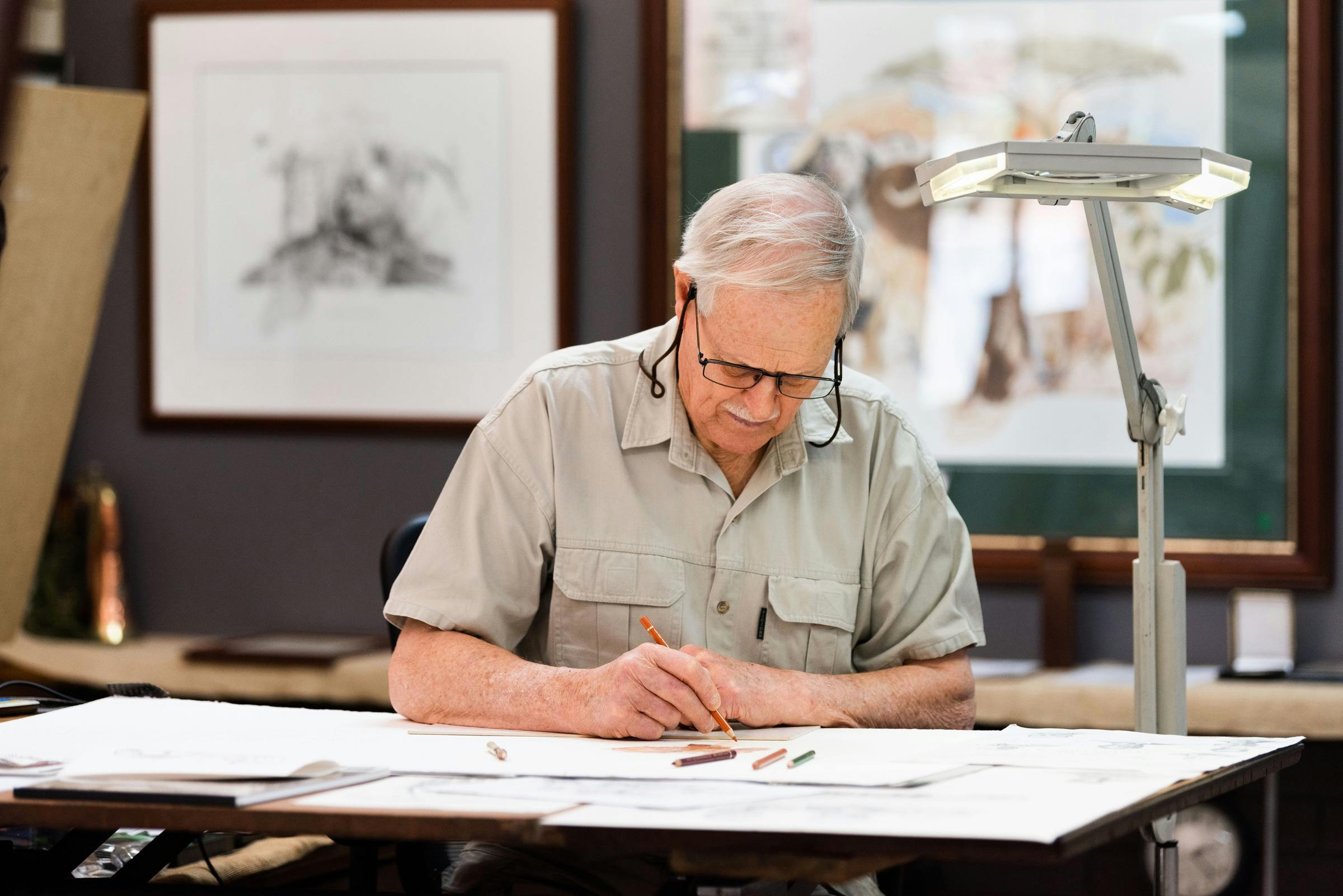 Chris McClelland drawing in his Gallery/Studio at 95 Lachlan Street, Hay NSW