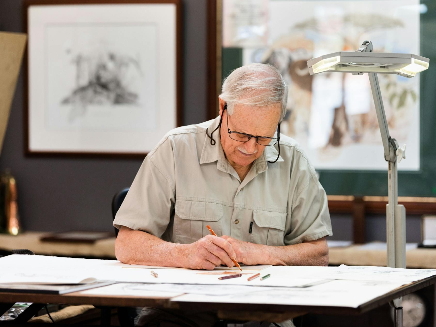 Chris McClelland drawing in his Gallery/Studio at 95 Lachlan Street, Hay NSW