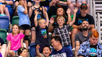 UC Capitals fans cheering in the crowd.