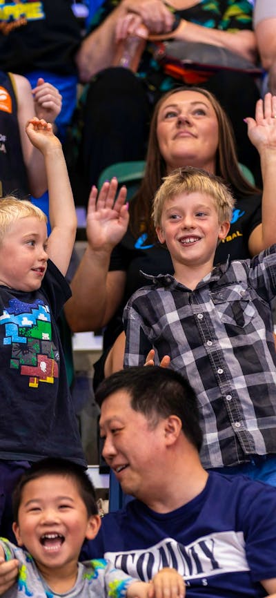 UC Capitals fans cheering in the crowd.