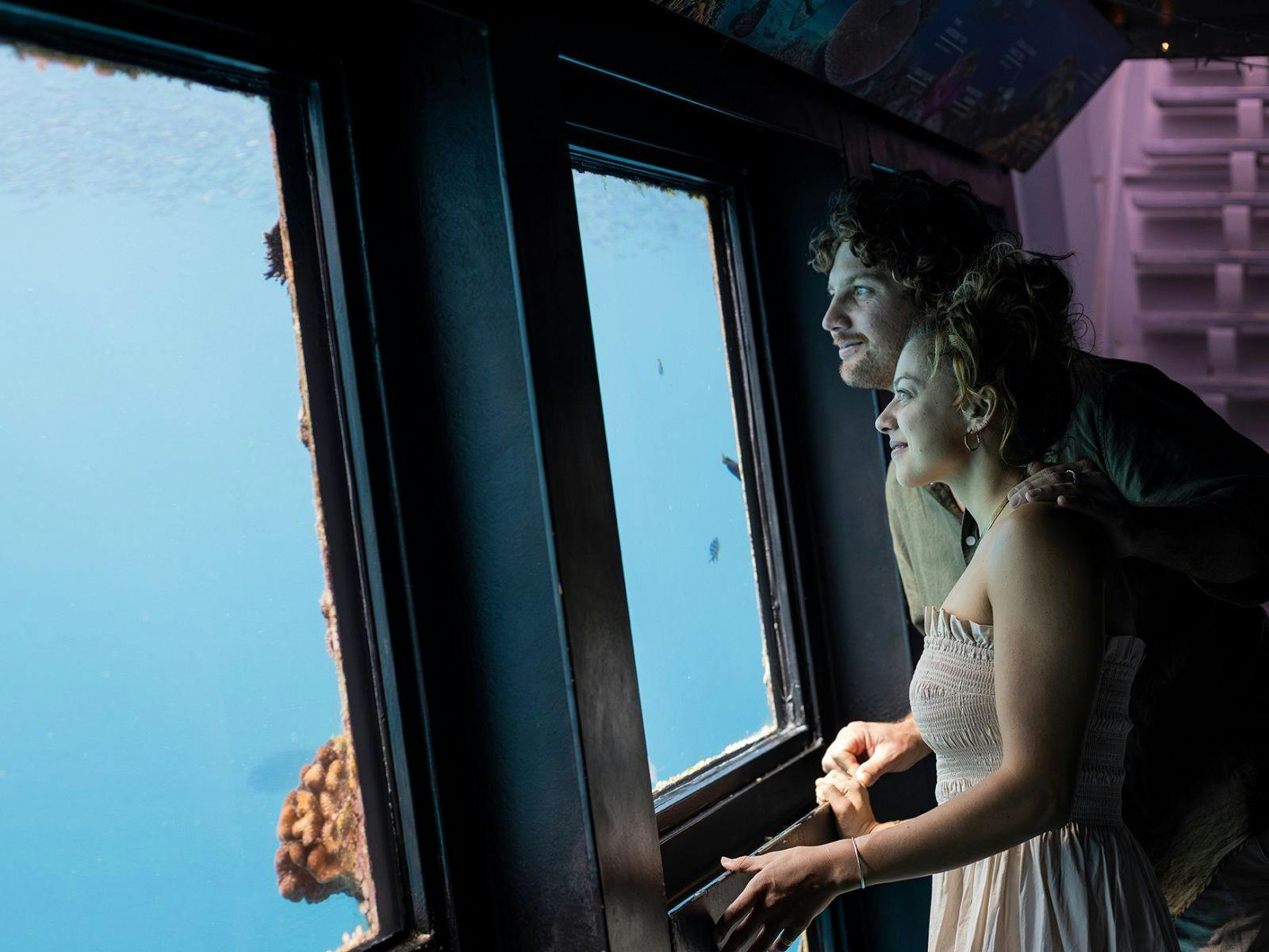 A couple enojying the underwater observatory