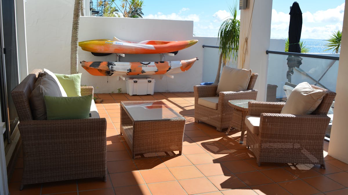 Outdoor entertainment and barbecue area overlooking the pool Outdoor entertainment and barbecue area overlooking the pool