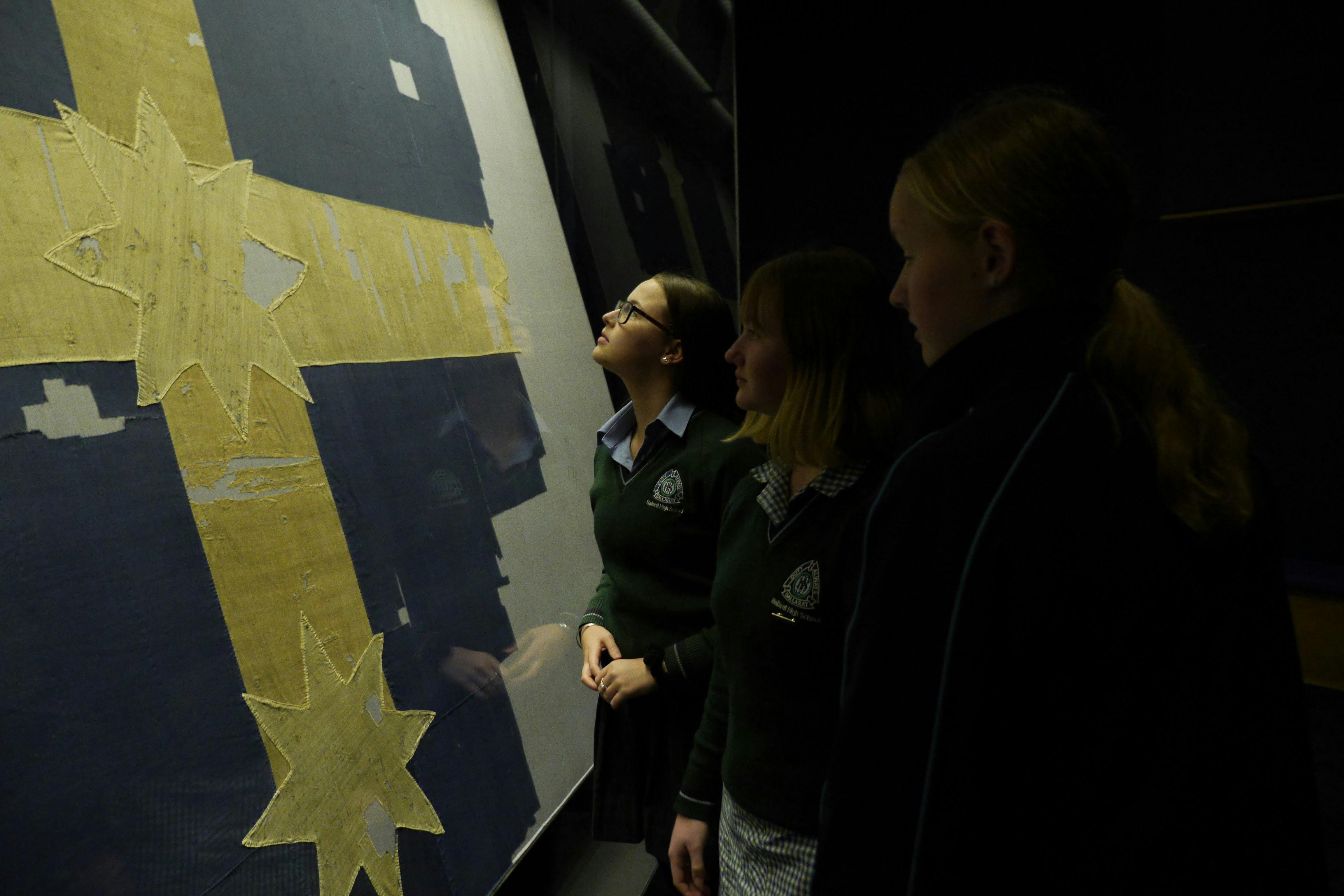 Students viewing the Eureka Flag