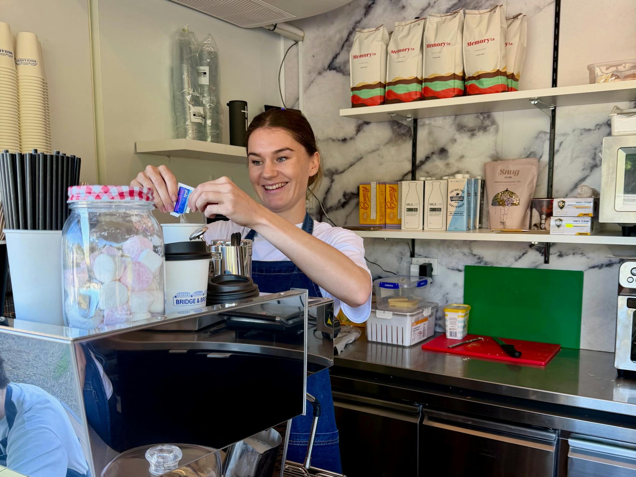 staff member making coffee