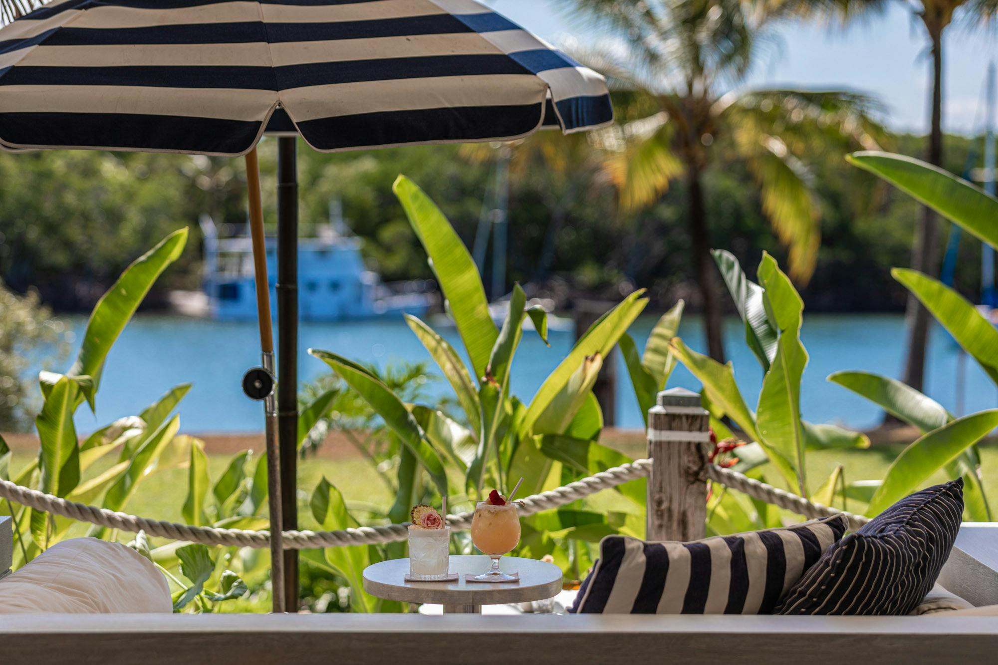 Located on the boardwalk at the marina with spectacular views over the Dickson Inlet to the Daintree