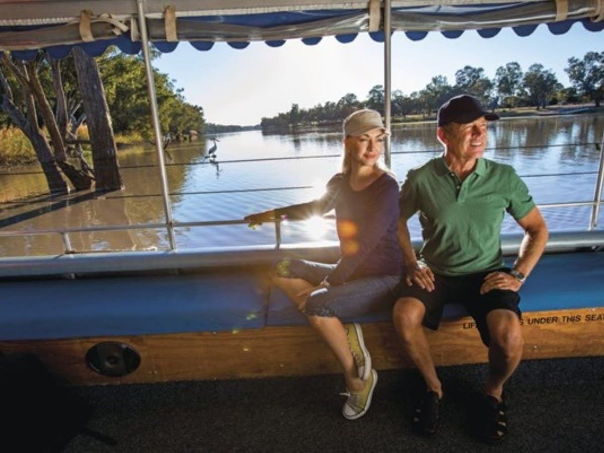 Man and Woman on a cruise down the Balonne River