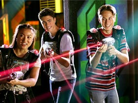 3 people enjoying a game of Laserquest