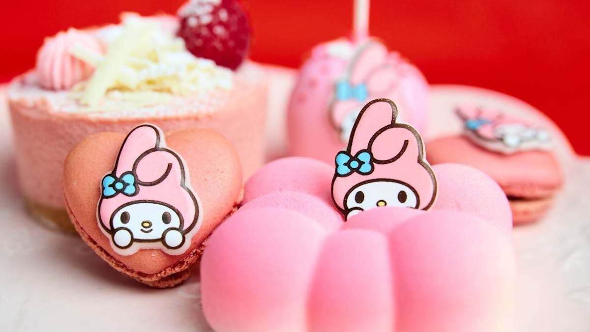 Pink My Melody themed desserts including a macaron and a cloud-shaped pastry.