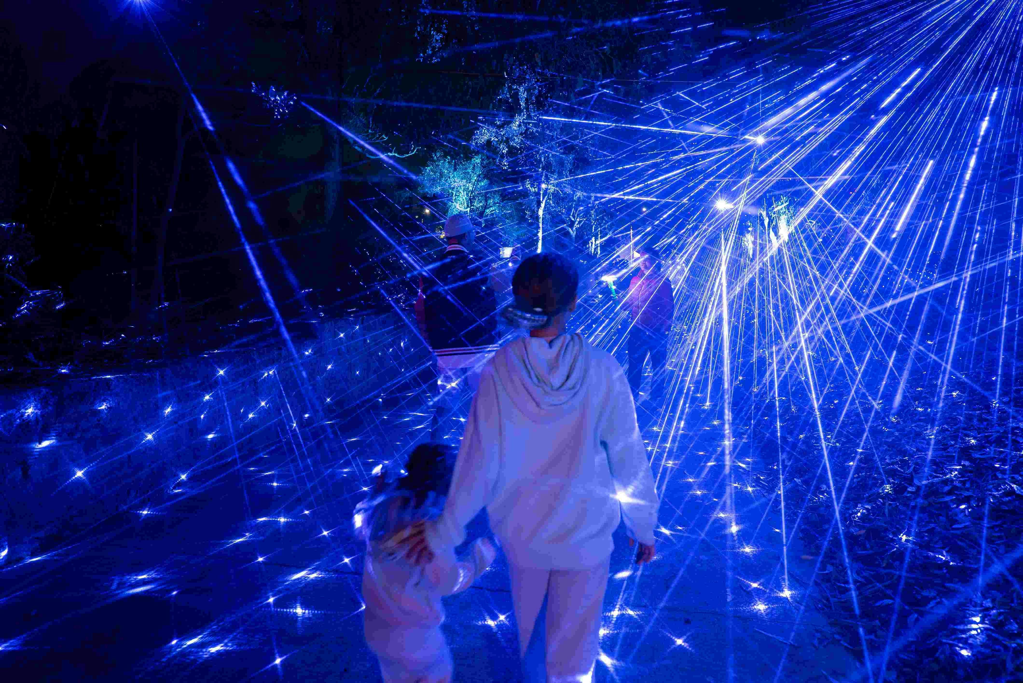 Blue laser light show with kids