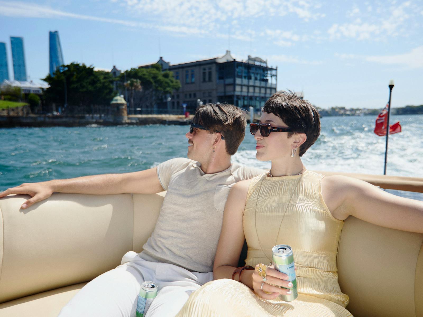 Private boat tour on MV Aquamajestic cruising Sydney Harbour with city skyline views.
