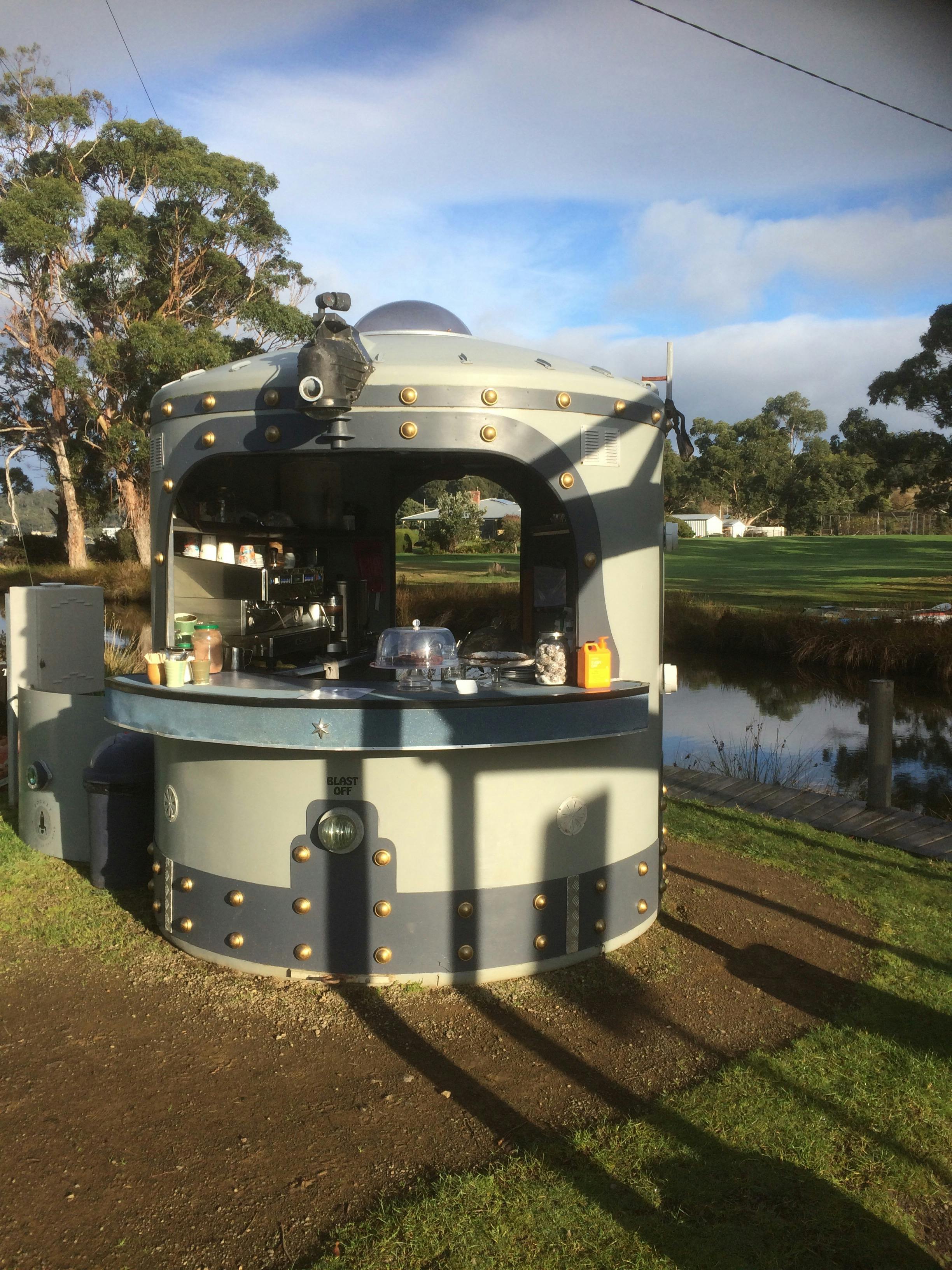 Picture of a pop-up cafe styled to look a little bit like a retro rocket