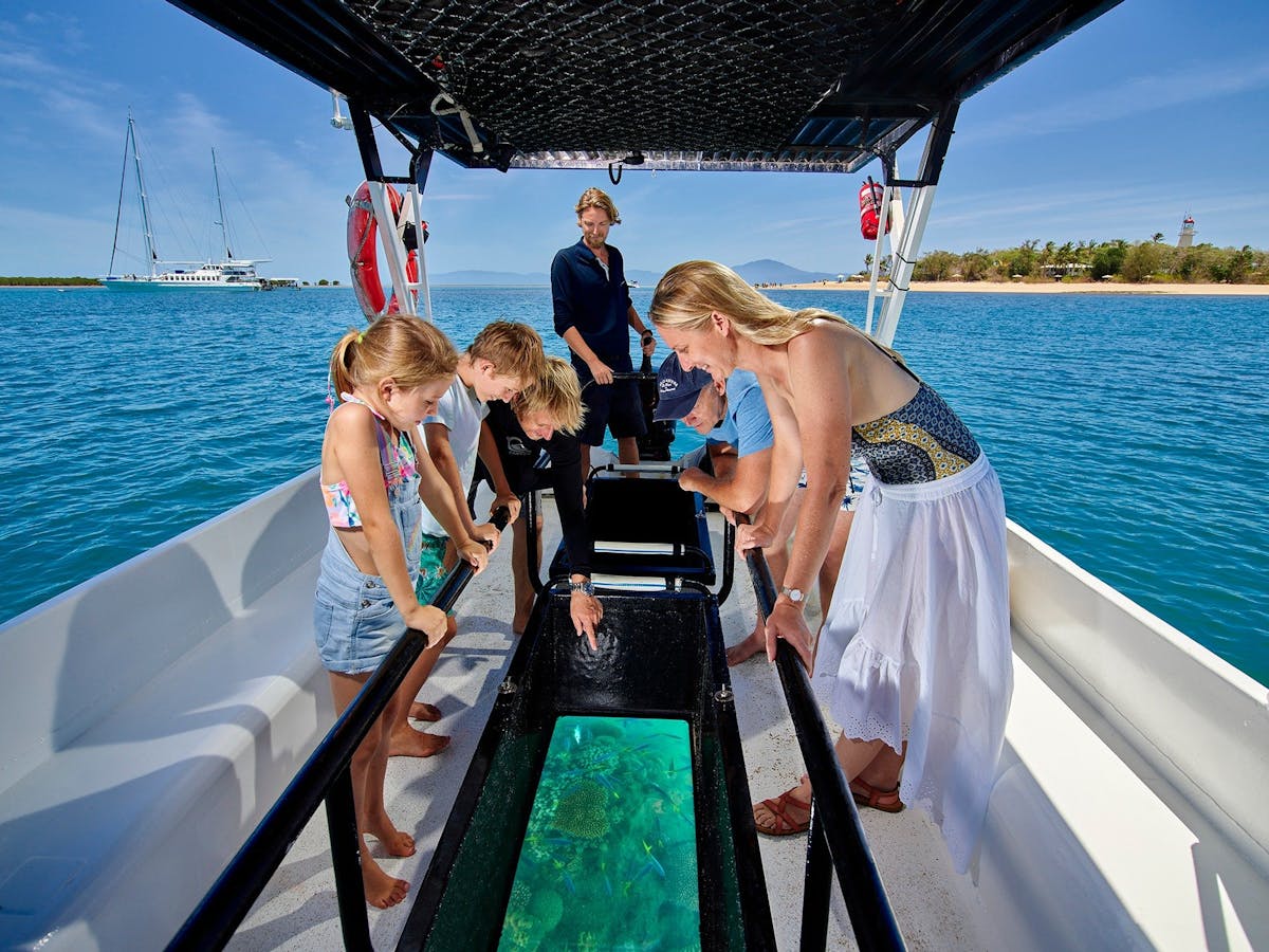 view the reef from a glass bottom boat