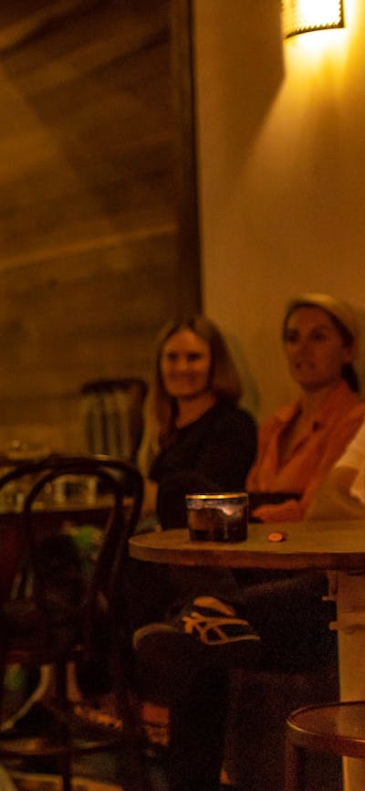 Burlesque performer swallowing fire