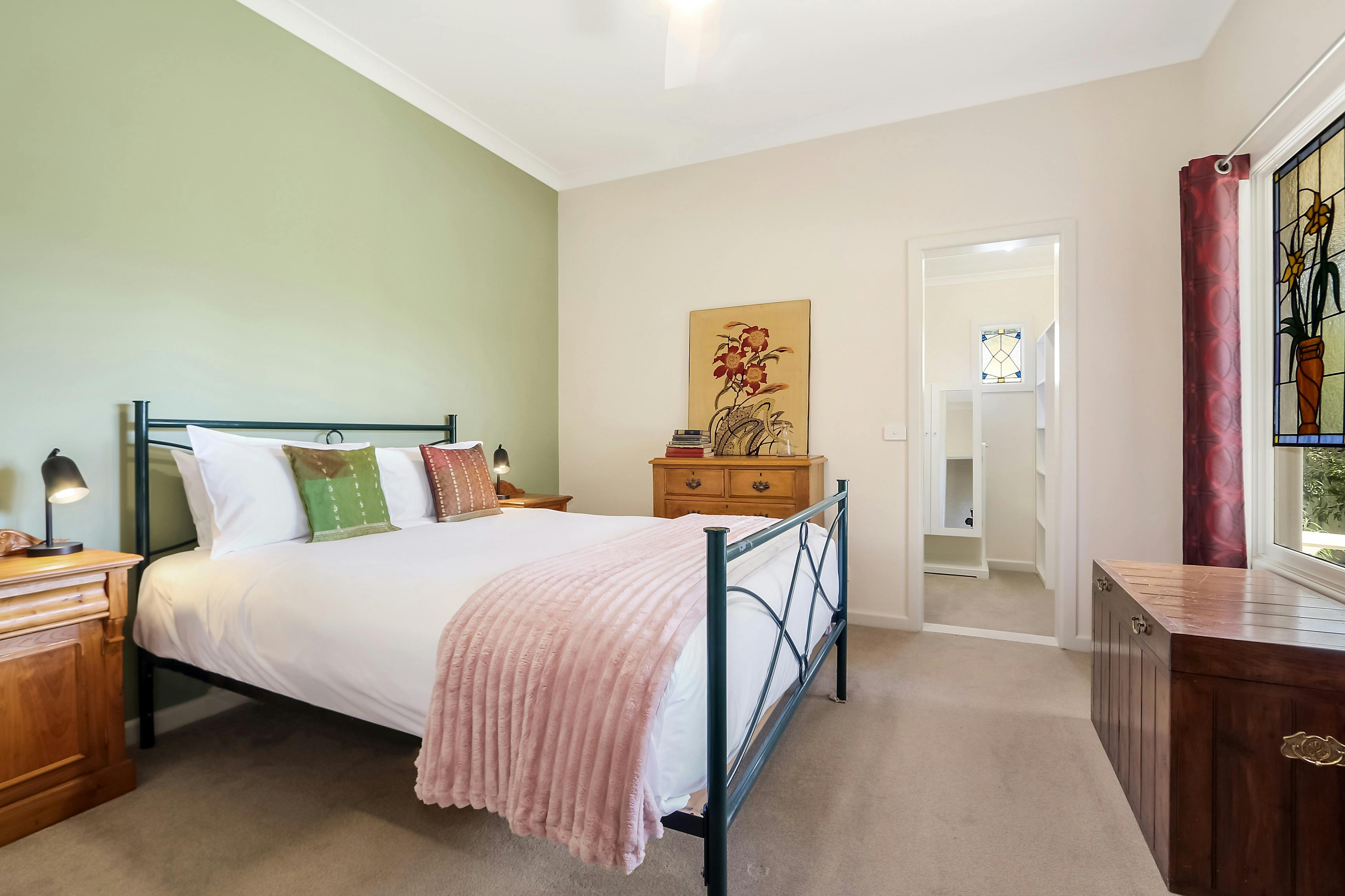 Spacious Bedroom  with soft furnishings