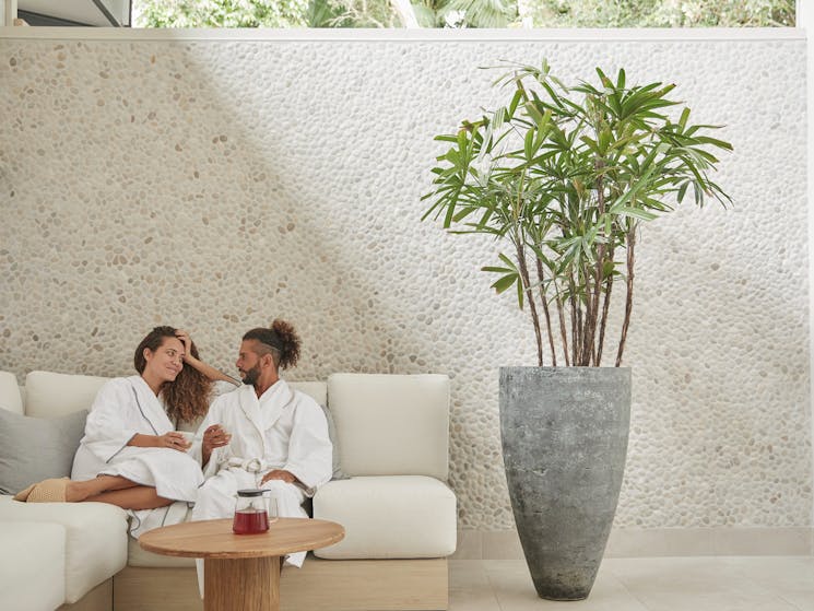 Eléme Day Spa outdoor relaxation area with couple