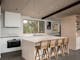 silver house, 218 mt buffalo road,  kitchen with a kitchen island and four tall chairs and an oven