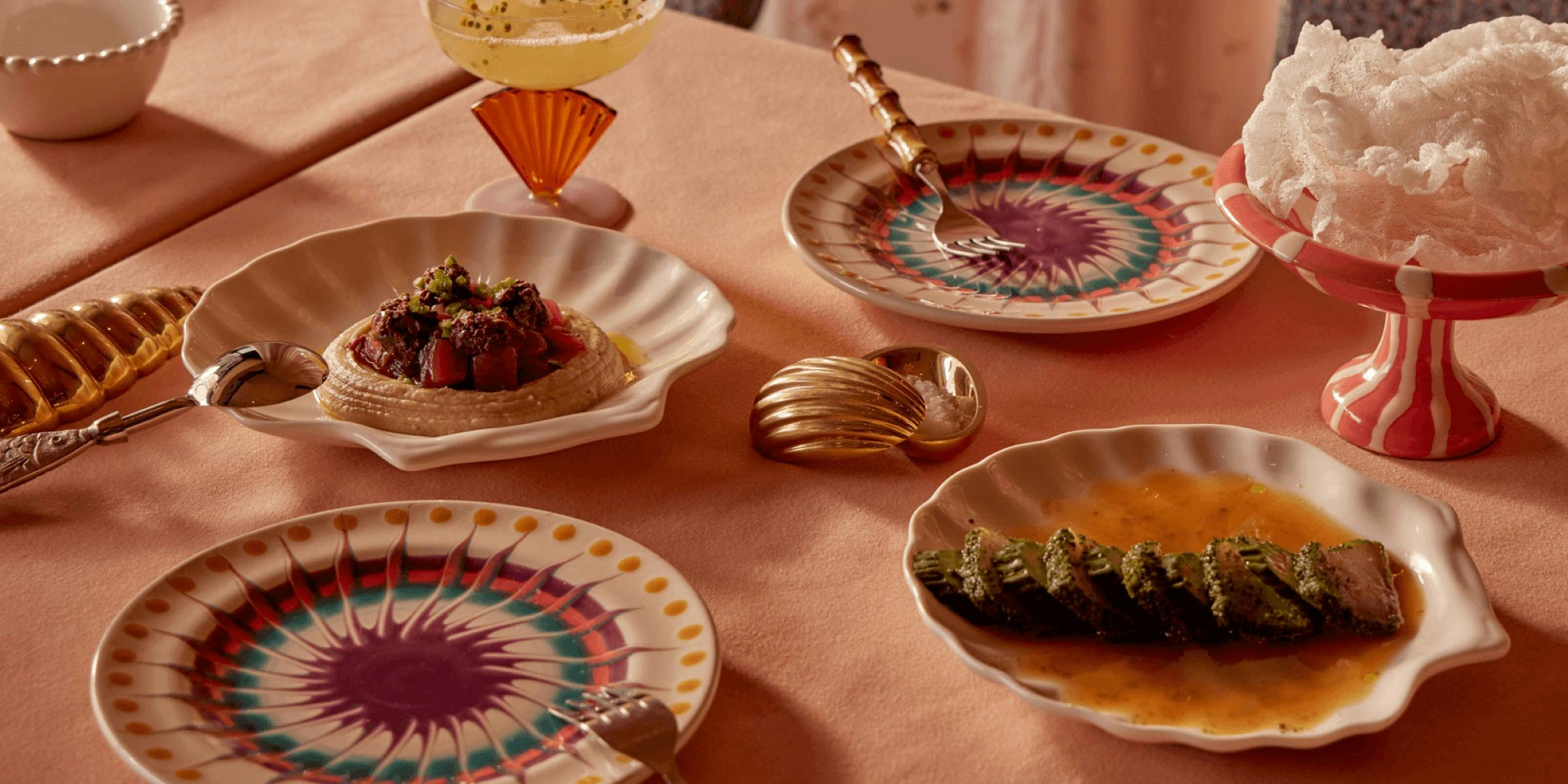 plates and food on a table at Akti Greek Restaurant Woolloomooloo Sydney