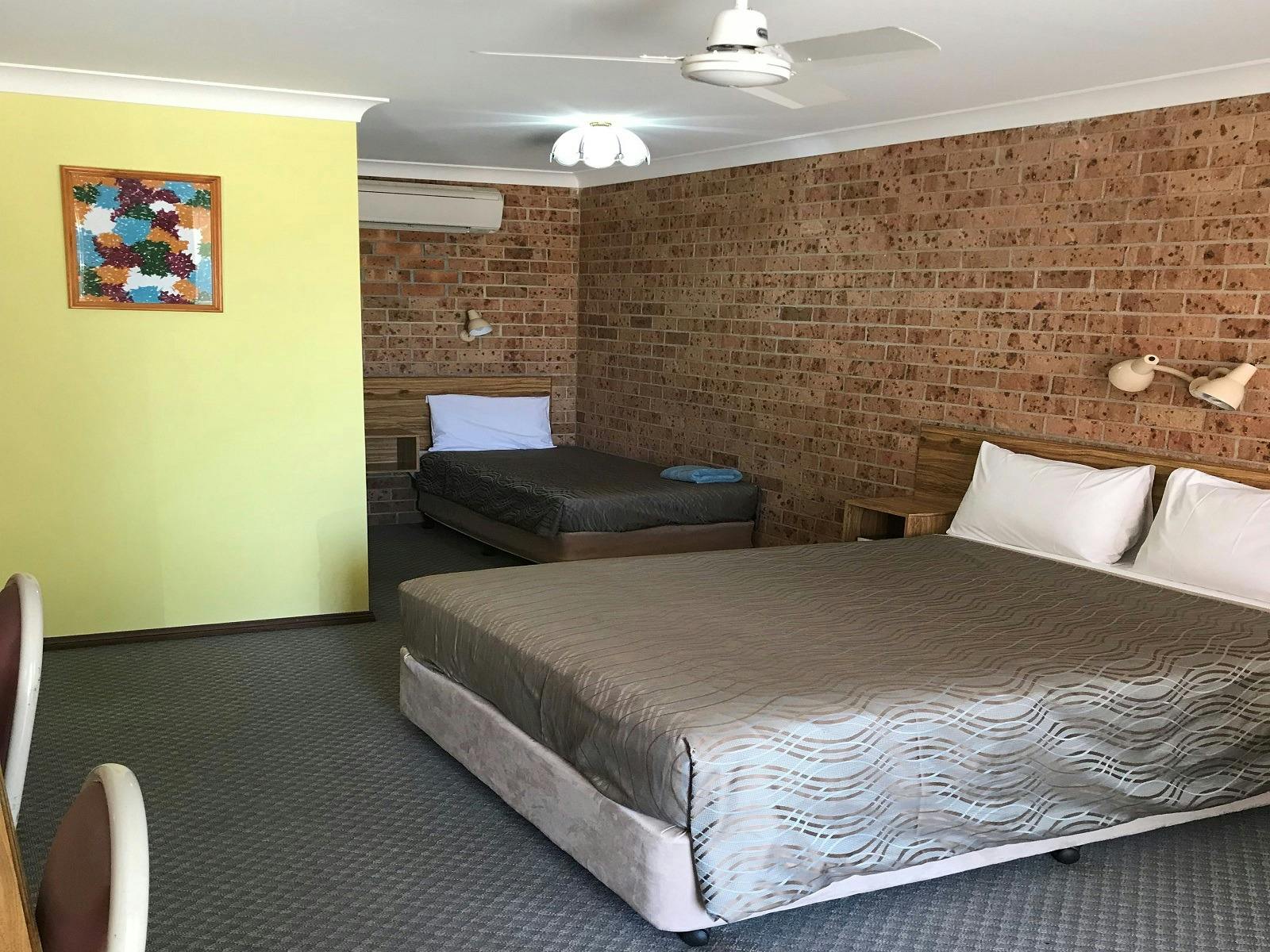 Photo of Twin Room consisting of Single Bed and Double Bed