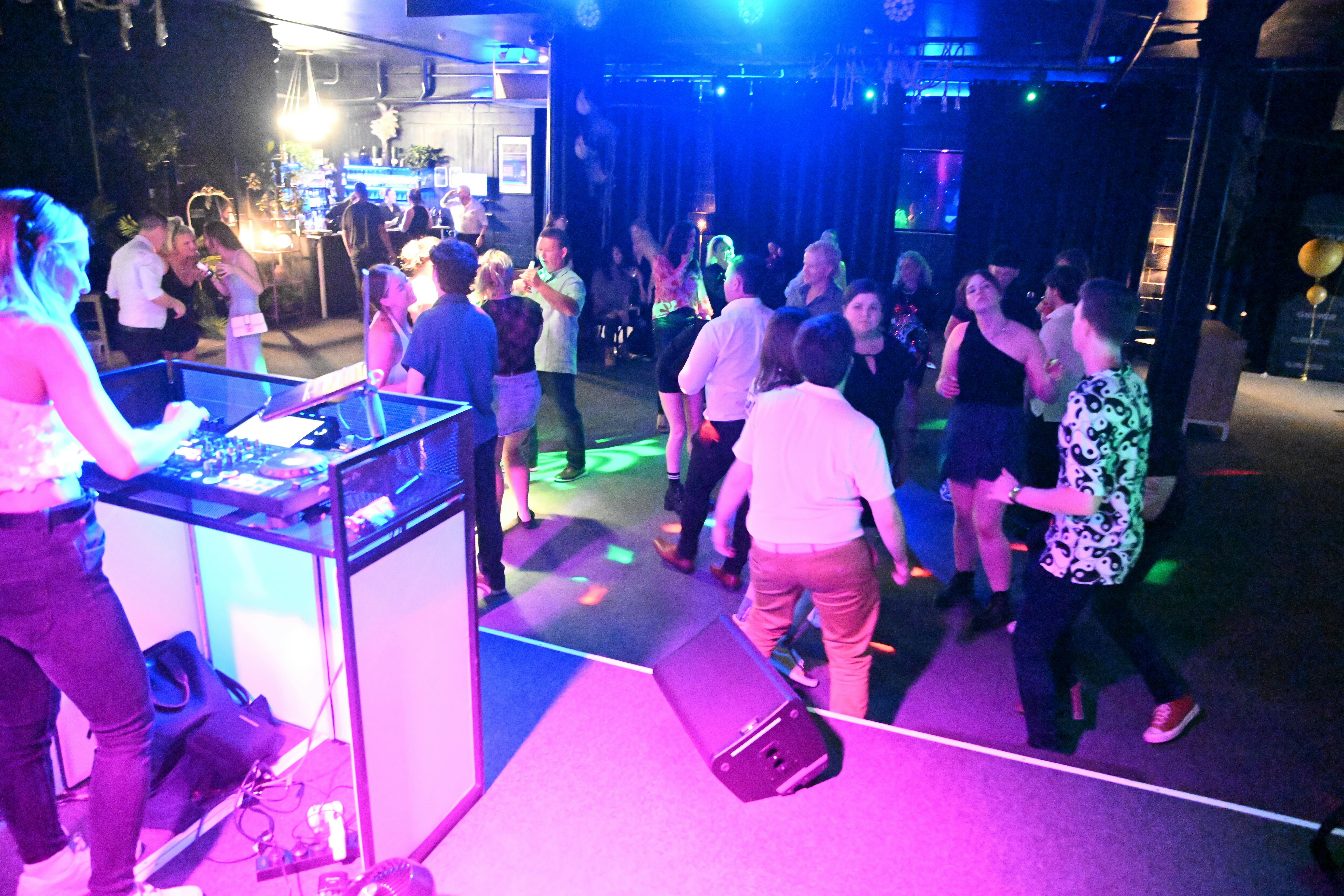 Bright lights shine on a full dancefloor on Club Noir's Night Club Night