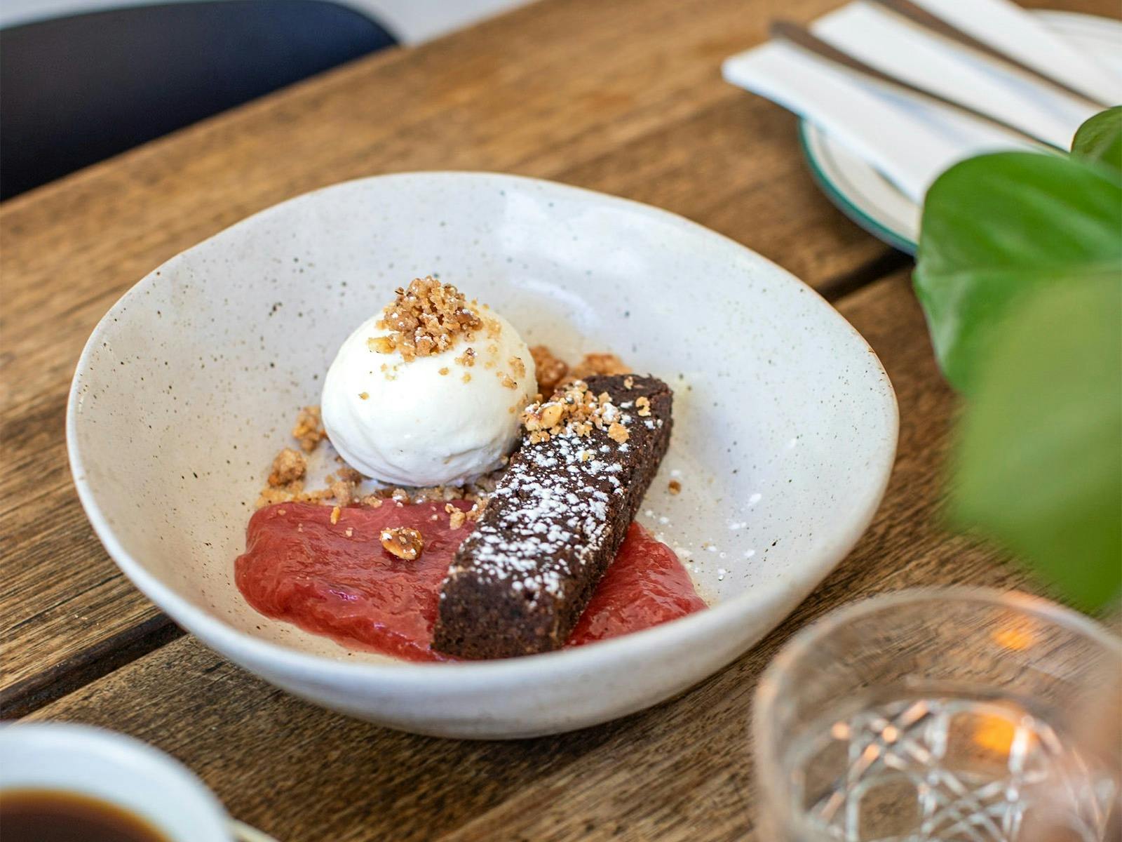 Chocolate and hazelnut torte, with stewed rhubarb, vanilla gelato, and a hazelnut crumb