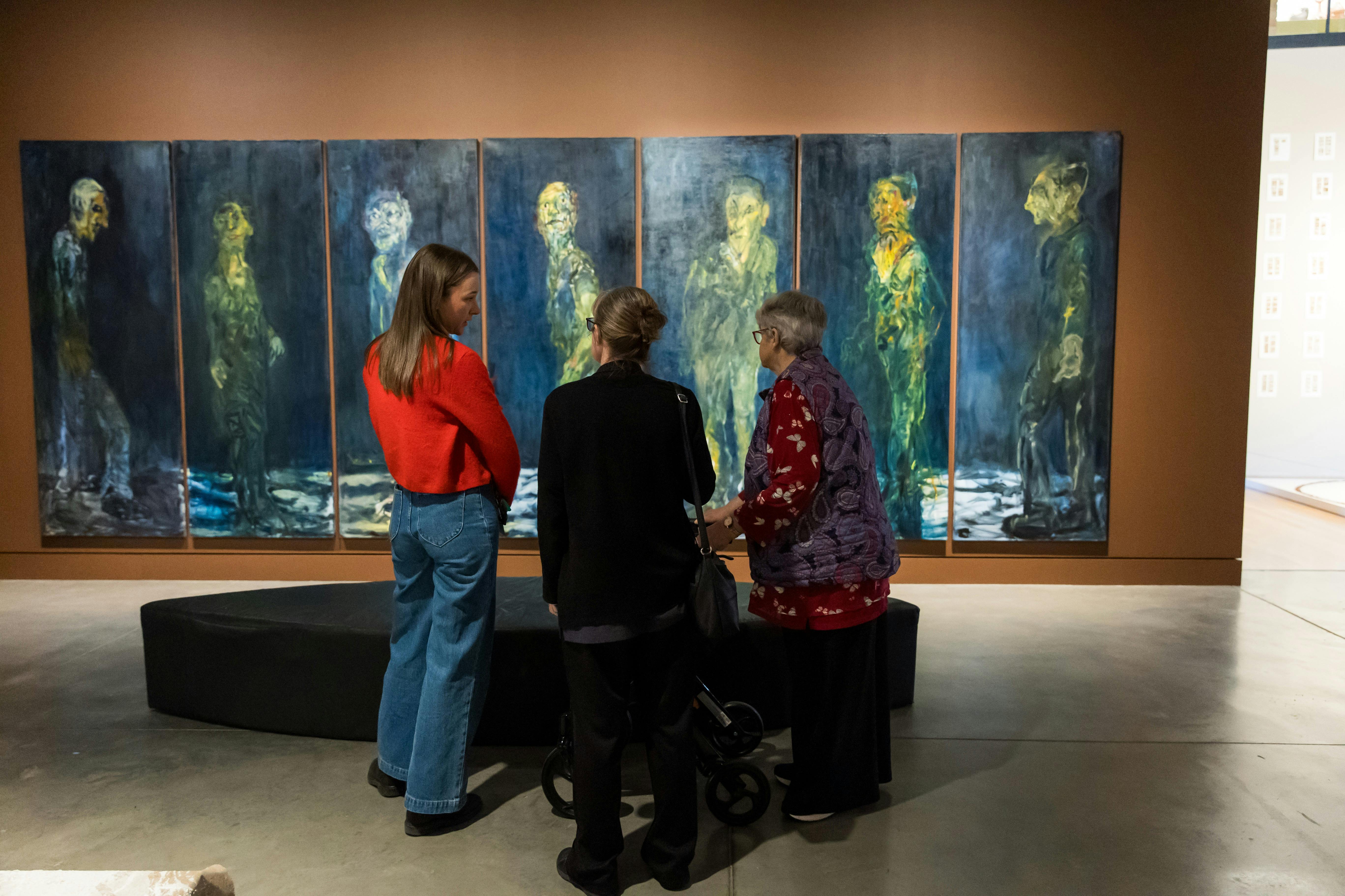 A group taking a guided tour at MRAG