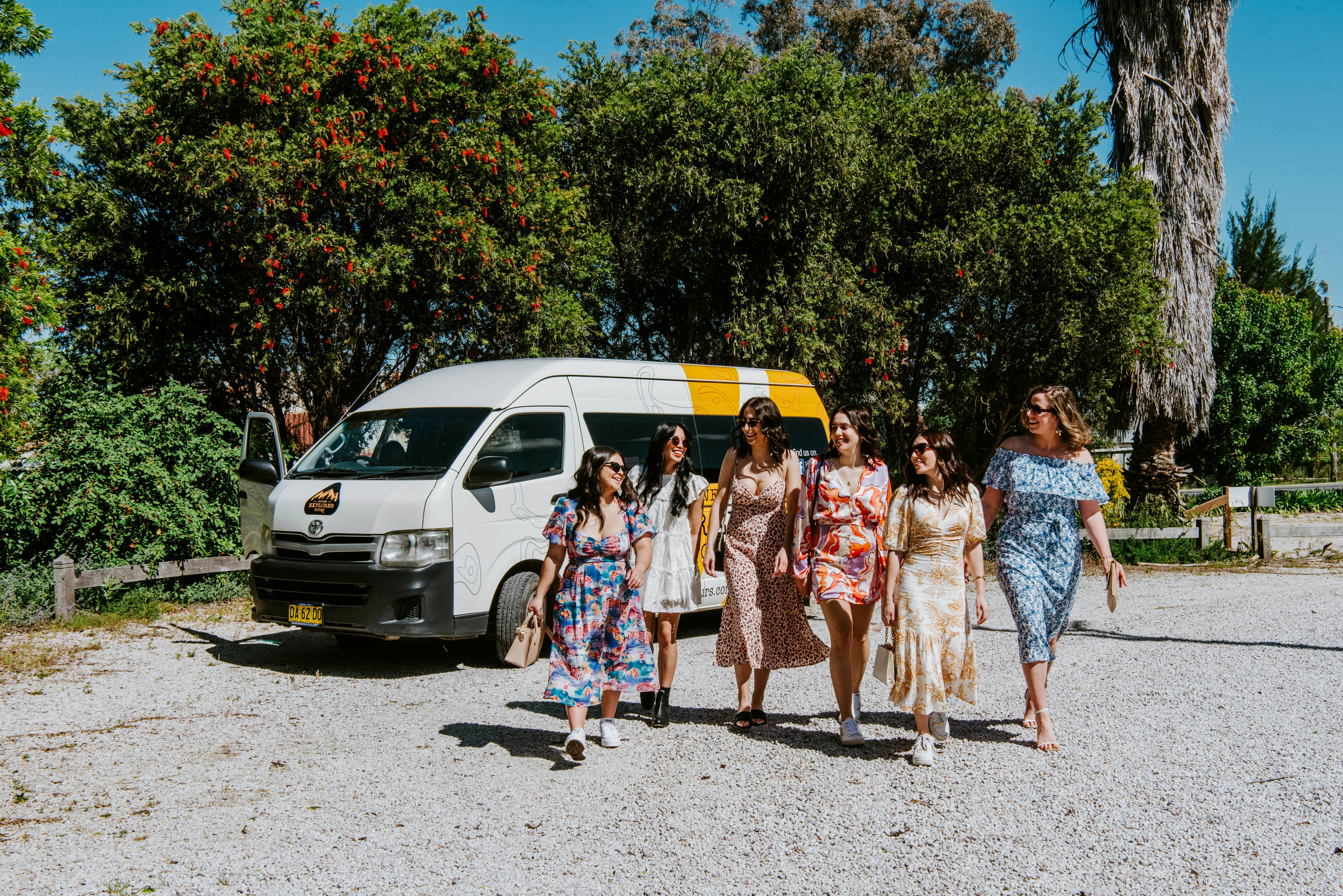 Girls walking away from bus