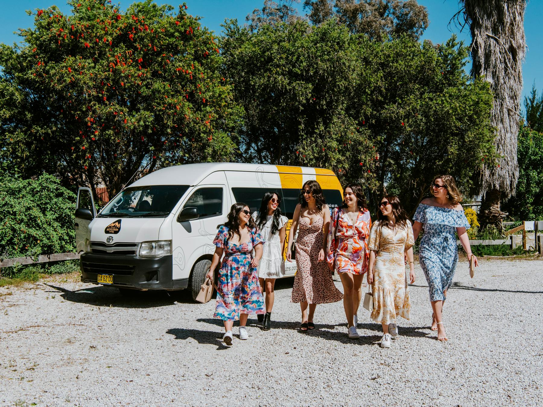 Girls walking away from bus