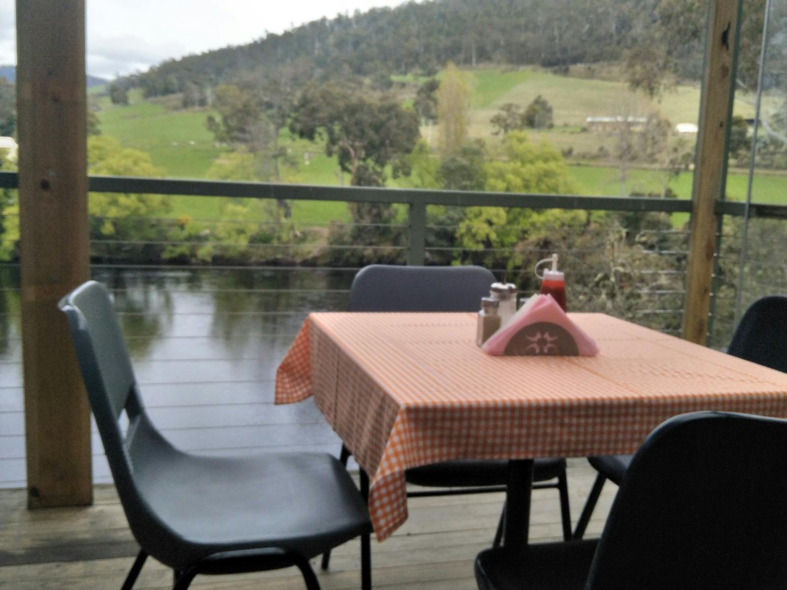 The Deck of the Judbury Community Center overlooking the mighty Huon River. Judbury Market.