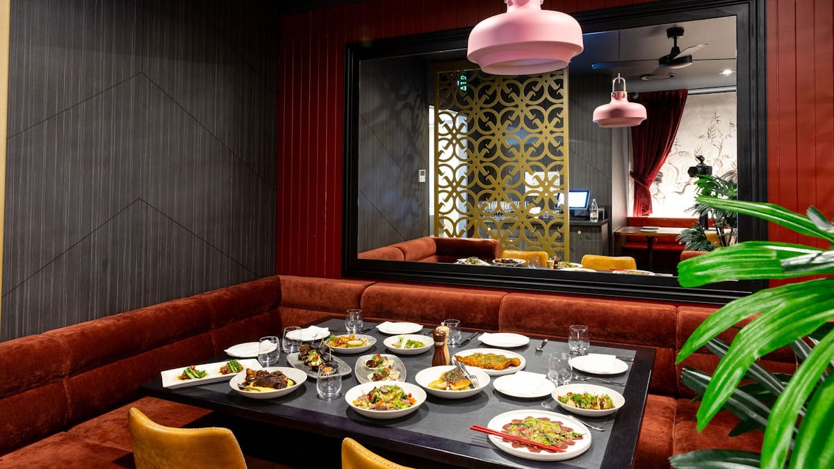 Asian fusion food spread on semi-private table