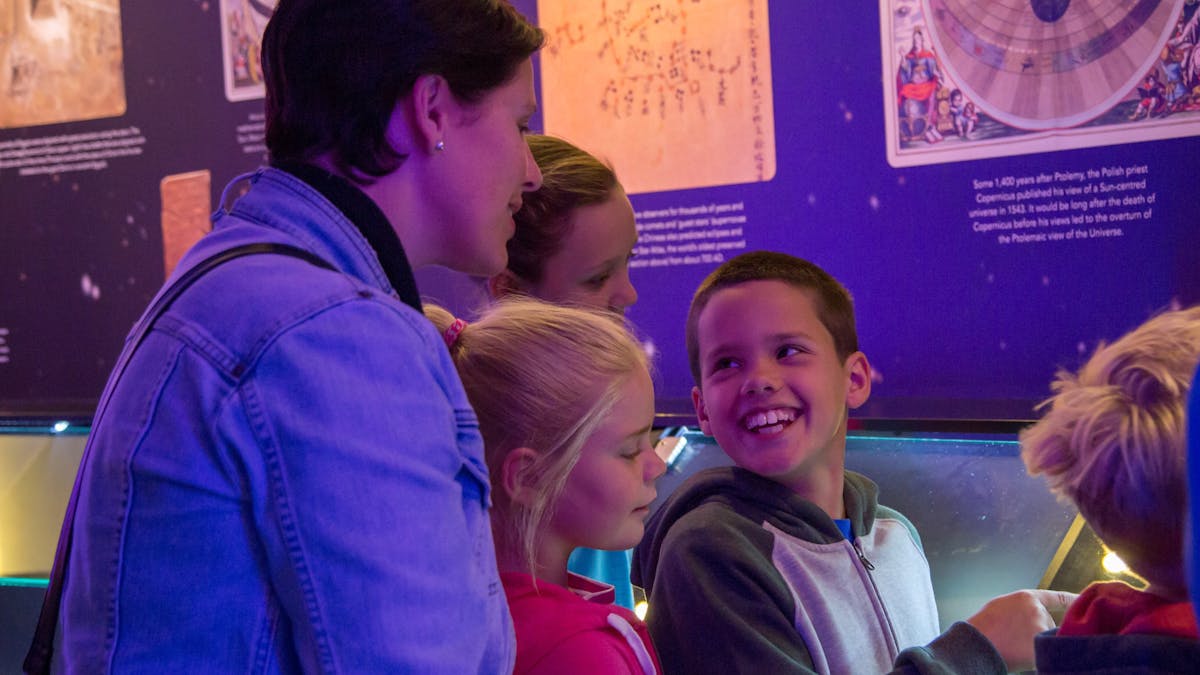 Family enjoying the Planetarium display zone
