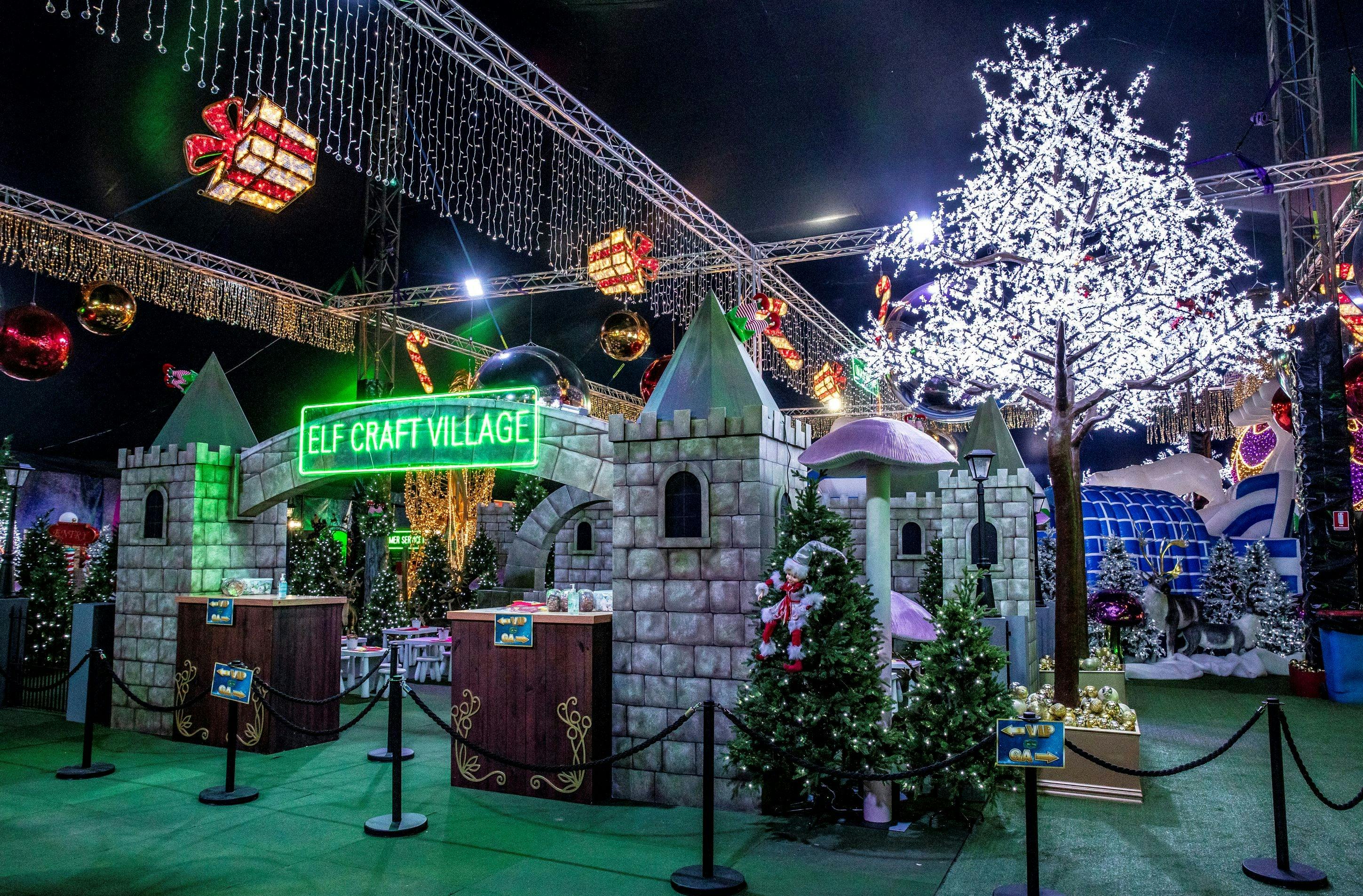 Elf Craft Village is lit up in Christmas lights and colour